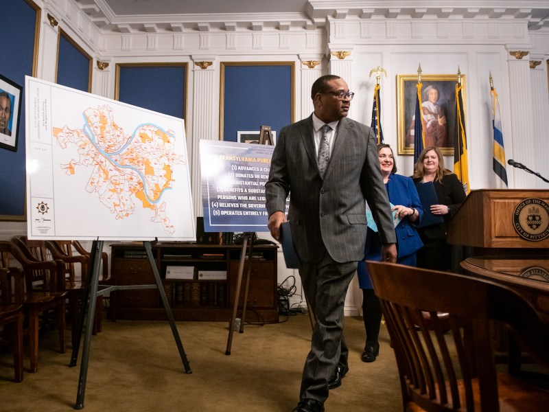 Pittsburgh Mayor Ed Gainey, Krysia M. Kubiak, chief legal officer and city solicitor, and Jen Gula, director of finance and treasurer for the city, walk past a map of the city’s tax-exempt property after announcing a review of those parcels on Jan. 24, at the mayor’s City-County Building offices in Downtown.