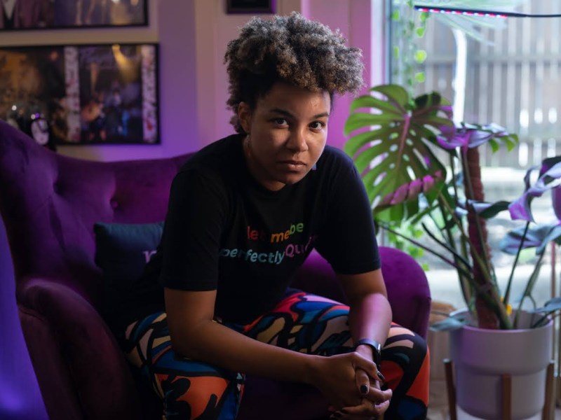 Coley Alston, program director of Hugh Lane Wellness Foundation, sits for a portrait in their office on Monday, March 6, 2023, in East Liberty. Alston is an advocate for inclusive healthcare for all gender expressions. (Photo by Stephanie Strasburg/PublicSource)