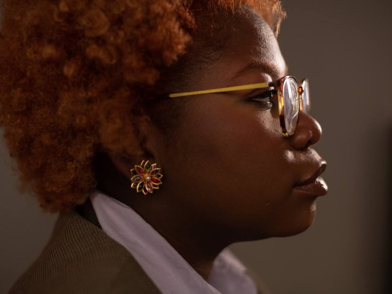 Sarah Gethers sits for a portrait in her apartment on Wednesday, March 15, 2023, in Bellevue. If I’m ‘the demographic corporate America wants so desperately,’ why am I constantly sidelined? Writes Gethers in her first person essay. (Photo by Stephanie Strasburg/PublicSource)