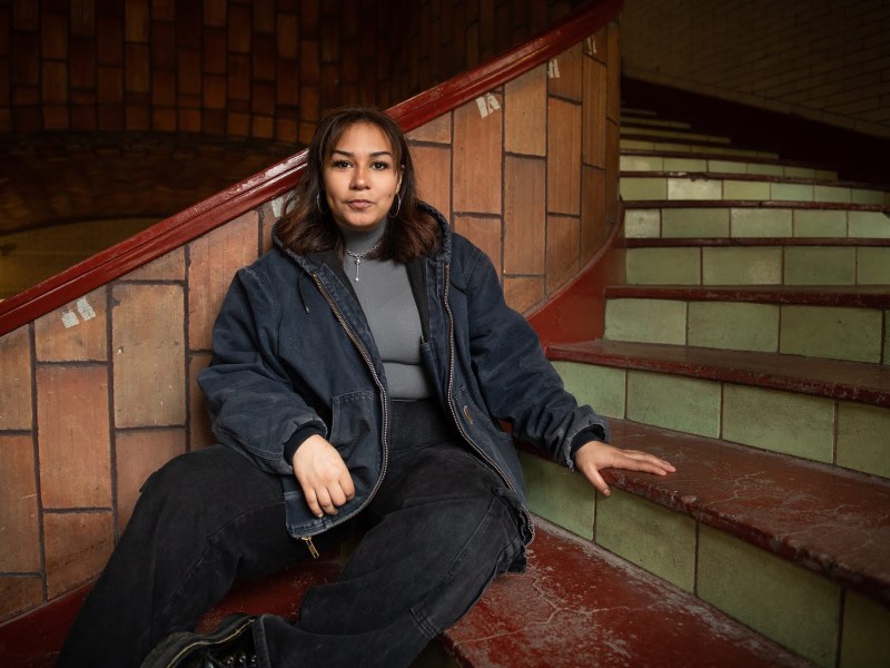 Paloma Del Toro, a junior at Carnegie Mellon University, sits for a portrait in Baker Hall on March 23, 2023. Del Toro started at a community college but transferred to CMU, taking out about $20,000 total. That debt would be wiped out under President Joe Biden's student loan forgiveness plan. (Photo by Stephanie Strasburg/PublicSource)