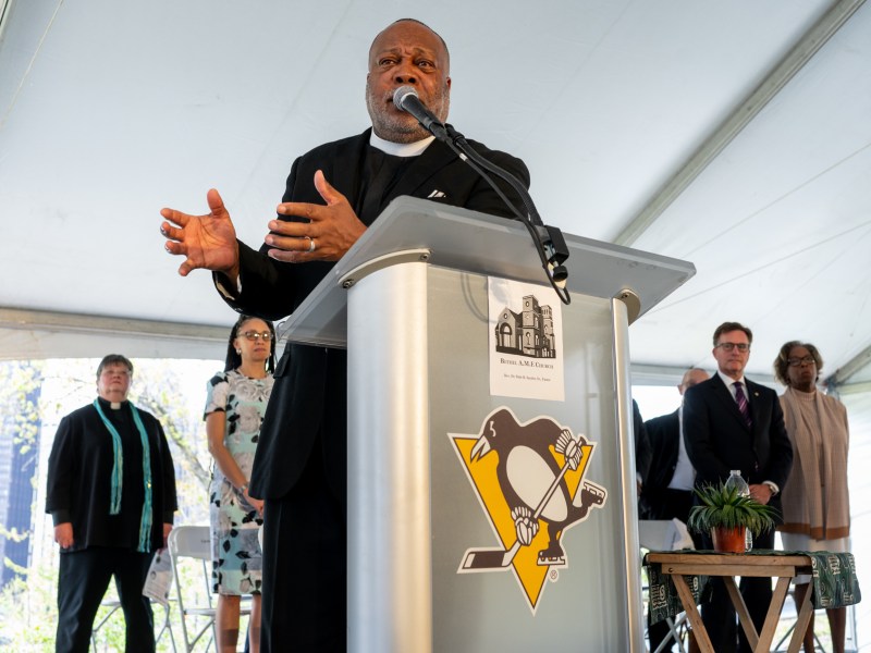 Rev. Dr. Dale B. Snyder, Sr., speaks at the rededication ceremony for Bethel AME Church where he is a pastor on Friday, April 14, 2023, at the former location of the legendary Lower Hill District church. “We earmark this land to lay the blueprint for present collaboration and as a model for future national expansion. We repurpose this land for the hopes and the dreams of generations to come,” he said. (Photo by Stephanie Strasburg/PublicSource)