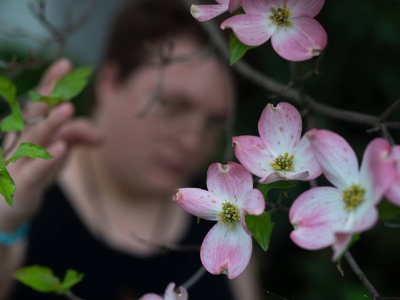 Juno St. Robbins, 26, by the Pittsburgh-area group home he lives in on Sunday, April 30, 2023. (Photo by Stephanie Strasburg/PublicSource)