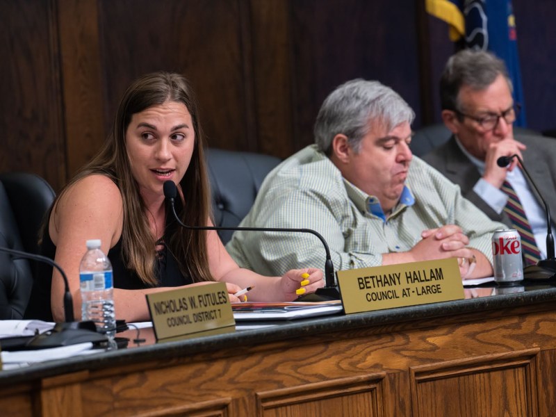 From left, Bethany Hallam, county councilwoman at-large, Patrick Catena, president of Allegheny County Council, and Paul Klein, councilman for District 11, sit at the council dais and discuss a proposed raise in wages for county workers during council’s regular meeting on Tuesday, June 6, 2023, at the Allegheny County Courthouse, Downtown. (Photo by Stephanie Strasburg/PublicSource)