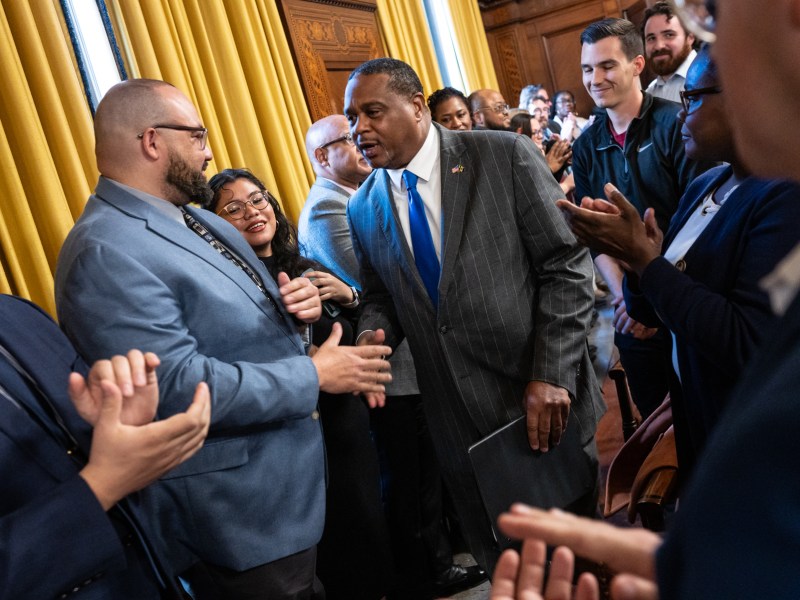 Mayor Ed Gainey enters the City Council Chambers to applause as he arrives to give his 2023 budget address on Monday, Nov. 13, 2023, at the City-County Building in downtown Pittsburgh. (Photo by Stephanie Strasburg/PublicSource)