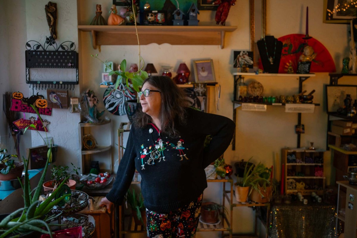 A woman standing in a store.