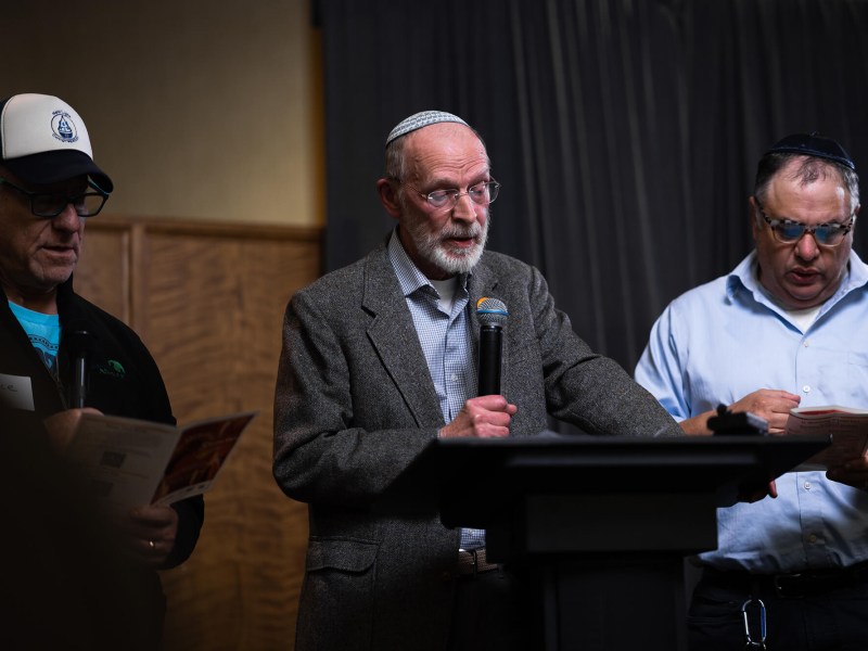 Dan Leger, a survivor from the Tree of Life mass shooting, welcomes everyone to Thursday evening’s events in advance of the fifth anniversary of the tragedy. (Photo by Ben Brady/PublicSource)