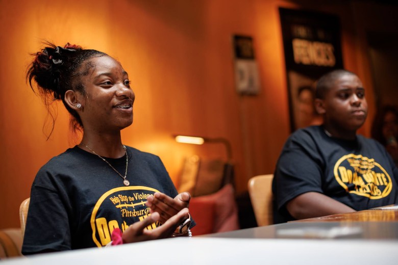 Jaia Harrison (left), a freshman at Northgate Senior High School and one of the Pittsburgh ambassadors to the Do the Write Thing program, with fellow ambassador Deahmi Mobley at PublicSource's office in Uptown Pittsburgh on Aug. 5, 2022. (Photo by Quinn Glabicki/PublicSource)