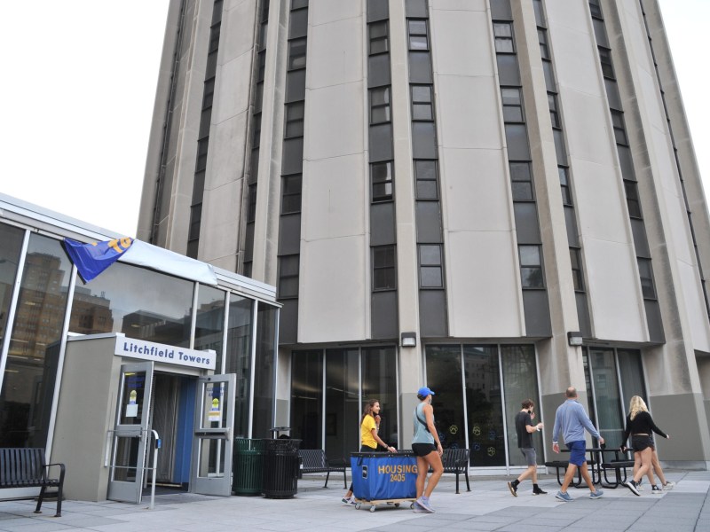 Students moving into Litchfield Towers, the largest cluster of dorms on Pitt's main campus, ahead of the new academic year during August 2022. (Photo by Alexandra Ross/The Pitt News)