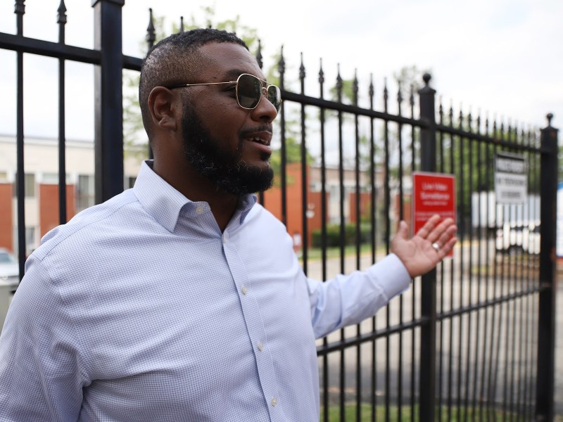 State Rep. Austin Davis, D-McKeesport, stands in front of Hi View Gardens, an affordable housing complex purchased in 2018 by PNC Bank. “They need to address the safety concerns immediately,” said Davis. “After reading your story, my initial question is: Is it safe for the people who live here to live here?” (Photo by Ryan Loew/PublicSource)