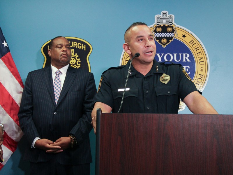 Pittsburgh Police Chief Larry Scirotto speaks at a July 19 press conference, as Mayor Ed Gainey looks on, at bureau headquarters. (Photo by Eric Jankiewicz/PublicSource)