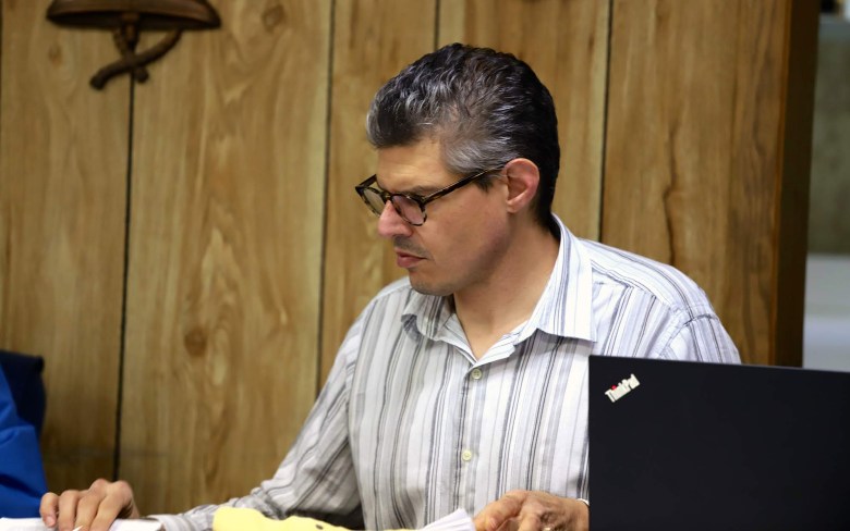 Borough Manager Seth Abrams works in East Pittsburgh's municipal office. (Photo by Jay Manning/PublicSource)