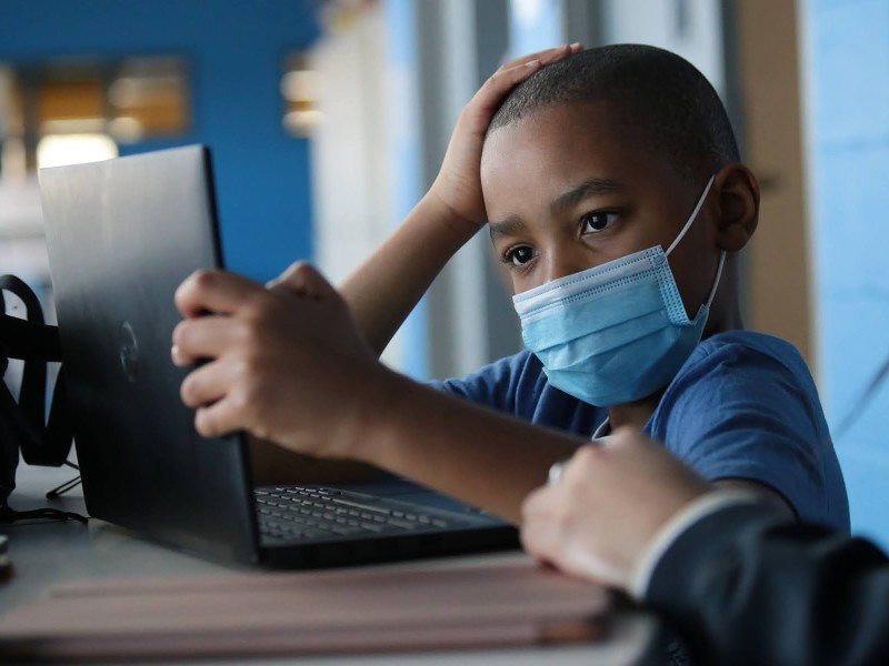 Donte Lane, Jr., a third grader at Fulton PreK-5, works on English Language Arts school work at the Boys & Girls Clubs of Western Pennsylvania's Lawrenceville location on Feb. 24. (Photo by Ryan Loew/PublicSource)