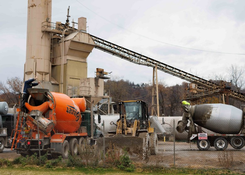 Concrete mixer truck on a concrete batch plant.