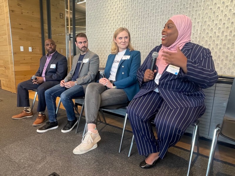 BLK DYMND Rewards CEO Art Robinson sits at left during a Philly Tech Weak 2023 panel. Three other panelists sit to his right. (Technical.ly Image)