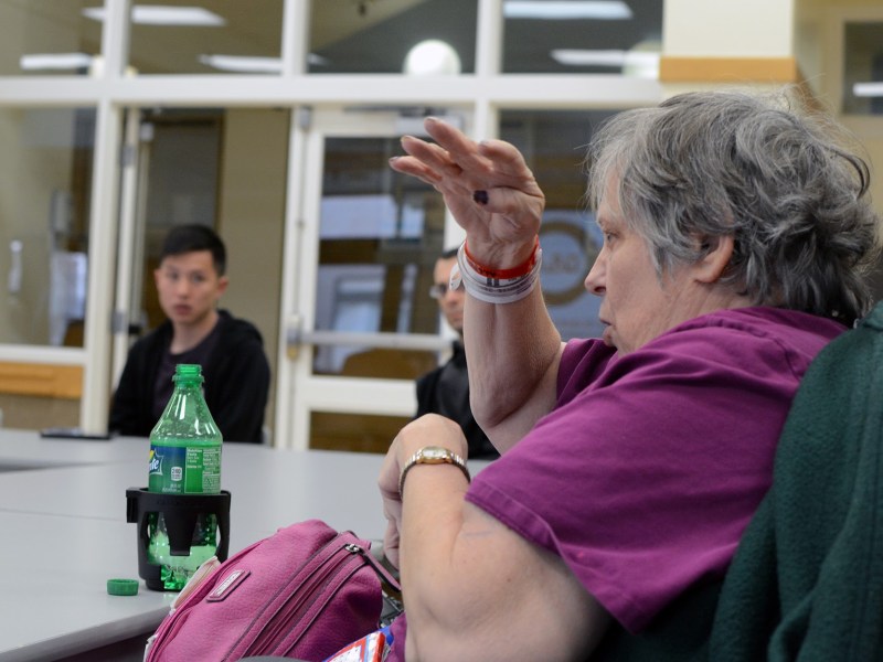 Connie Burger, 58, speaks during the Committee for Accessible Transportation meeting on March 29. Burger is worried bus rapid transit will hinder her use of the Port Authority’s paratransit. “I need the door to door service,” Burger said. (Photo by Stephen Caruso/PublicSource)