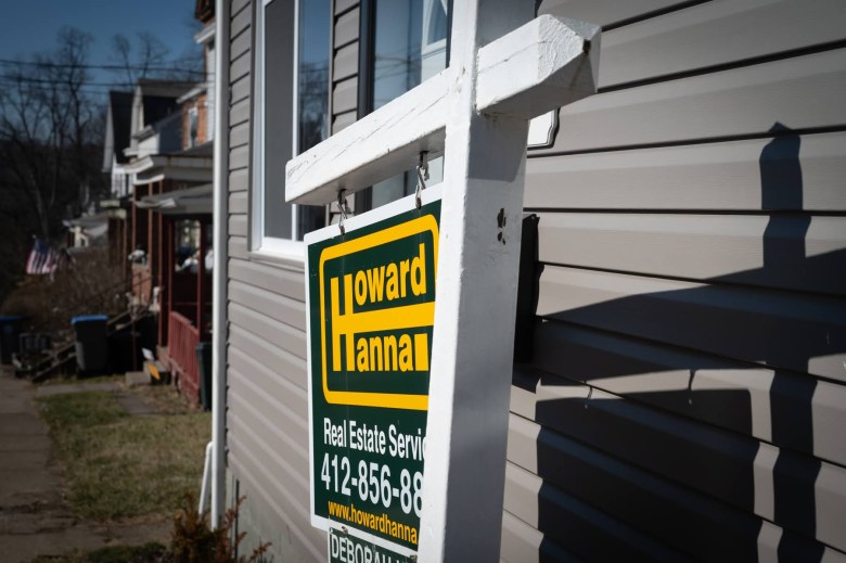 A for sale sign in front of a Verona home on Monday, Feb. 13, 2023. Homes that have sold for prices well above their assessed values have frequently been the subjects of assessment appeals by school districts in recent years. (Photo by Stephanie Strasburg/PublicSource)