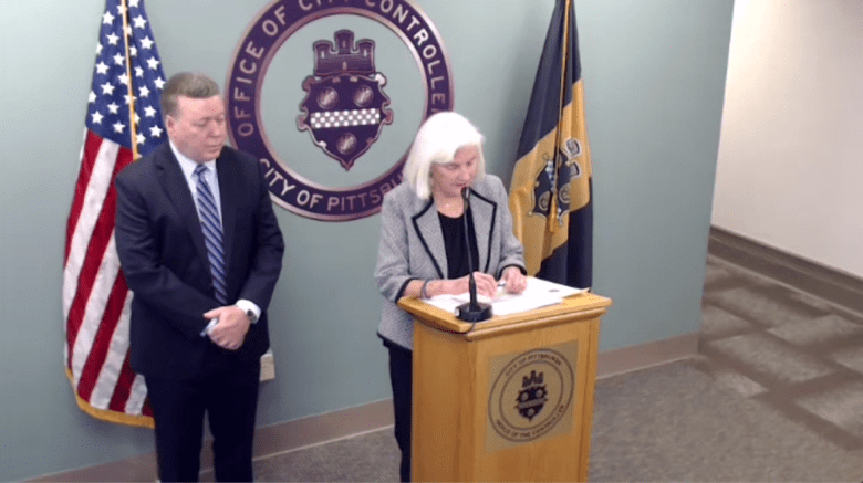 CPRB director Beth Pittinger (right) and City Controller Michael Lamb at a press conference Tuesday.